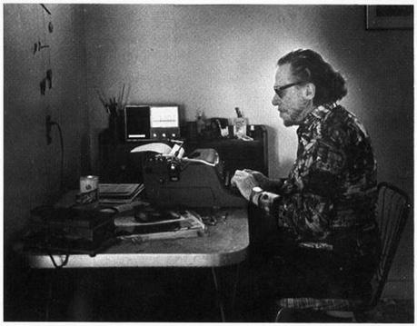 Postcard featuring Charles Bukowski at his typewriter in 1988. Photo by Joan Levine Gannij, published by Island International Bookstore, Amsterdam. Courtesy of the Huntington Library, Art Collections and Botanical Gardens. (HAND IN PHOTO 9-29-10)